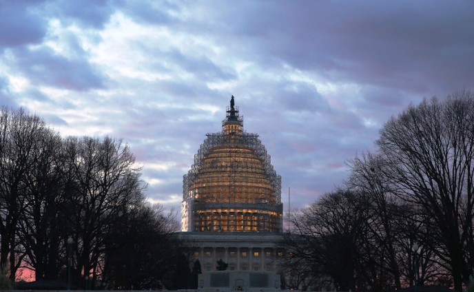 "WASHINGTON, DC - JANUARY 20:  The early morning sun begins to rise benhind the US Capitol building on January 20, 2015 in Washington, DC. Later this evening US President Barack Obama will deliver his sixth State Of The Union address to the nation.  (Photo by Mark Wilson/Getty Images)"
