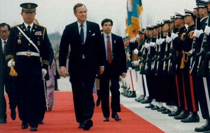 Merletti, following behind Present George H.W. Bush